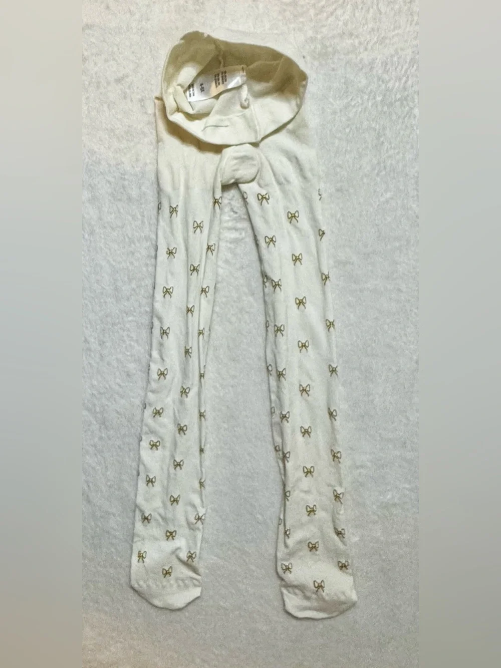 Girls Cream 4-6X stocking/tights with gold glitter bows